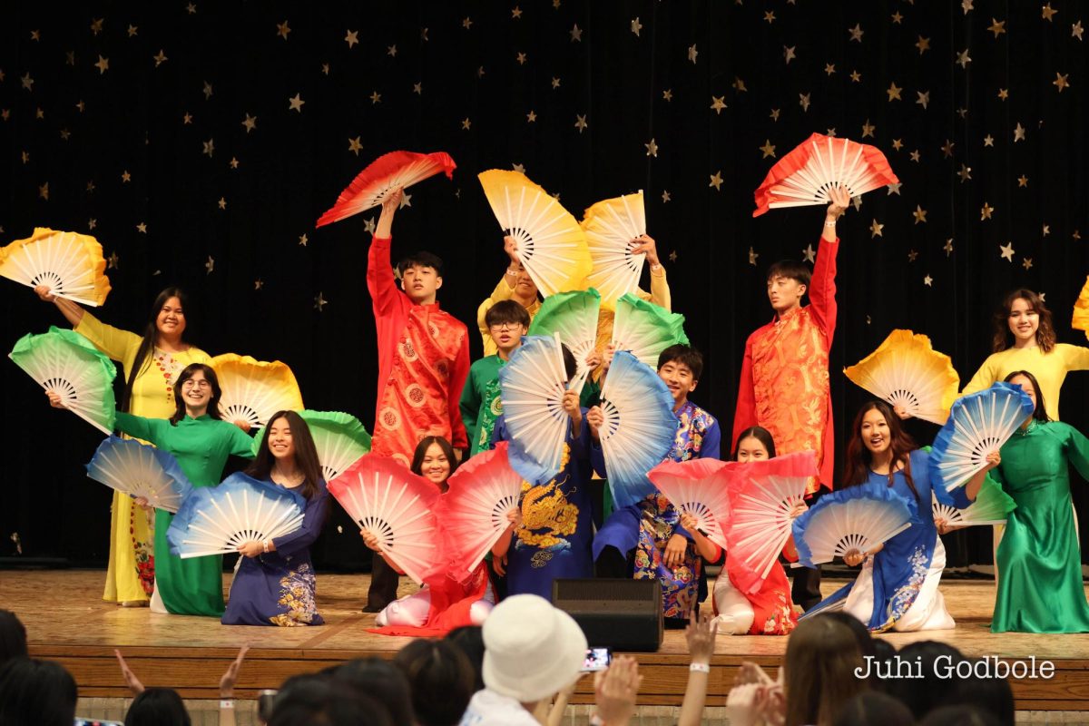 Students perform a traditional fan dance at I-Fest.