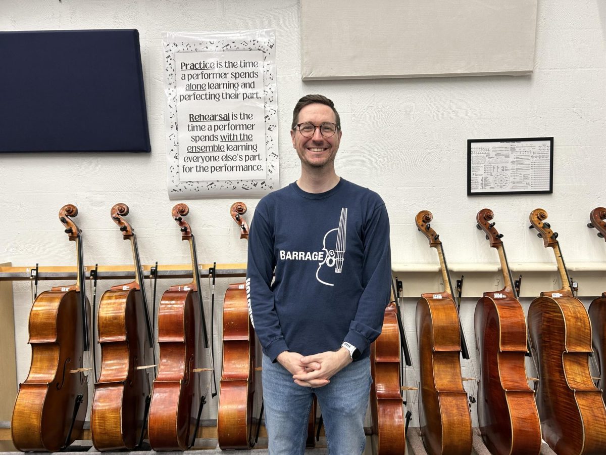 Orchestra Director Neal Springer, who juggles six different orchestras in all.