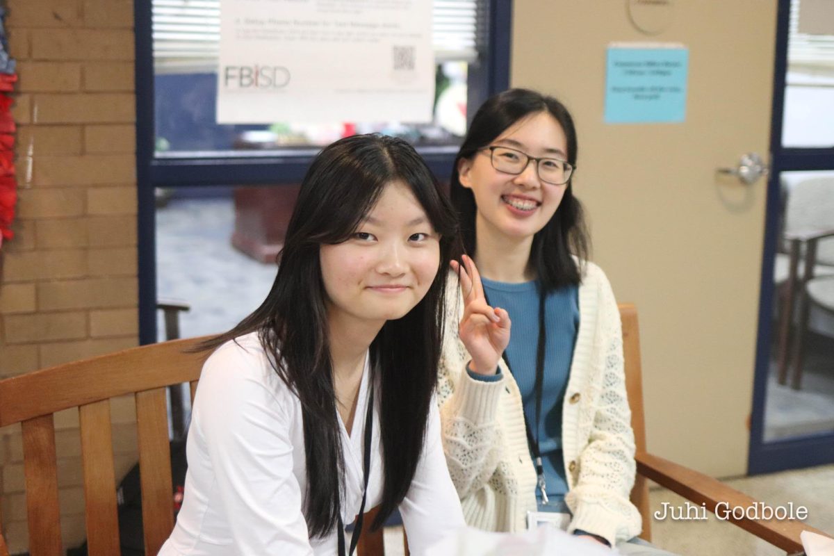 Junior Grace Hu (left) with Wei (right). Hu said she wouldn't have liked journalism as much without meeting Wei.