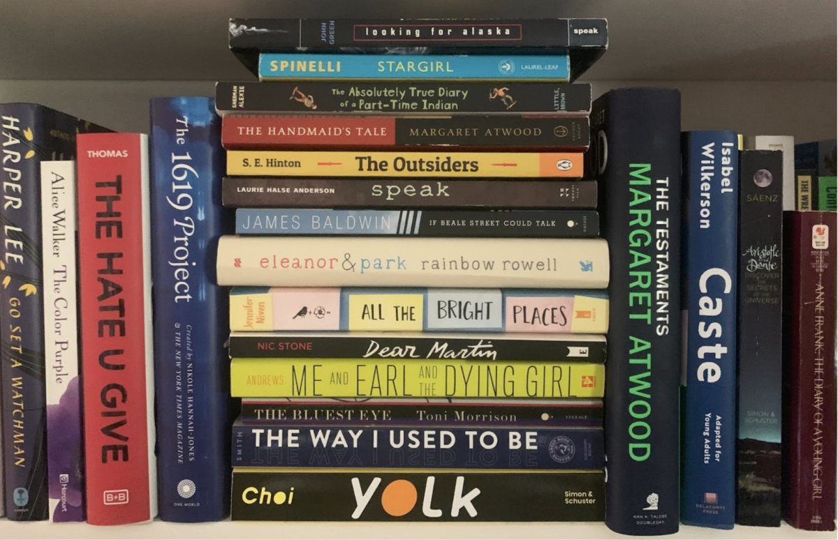 A shelf full of banned books: including "The Handmaid's Tale" by Margaret Atwood, "The Bluest Eye" by Toni Morrison and other notable titles.