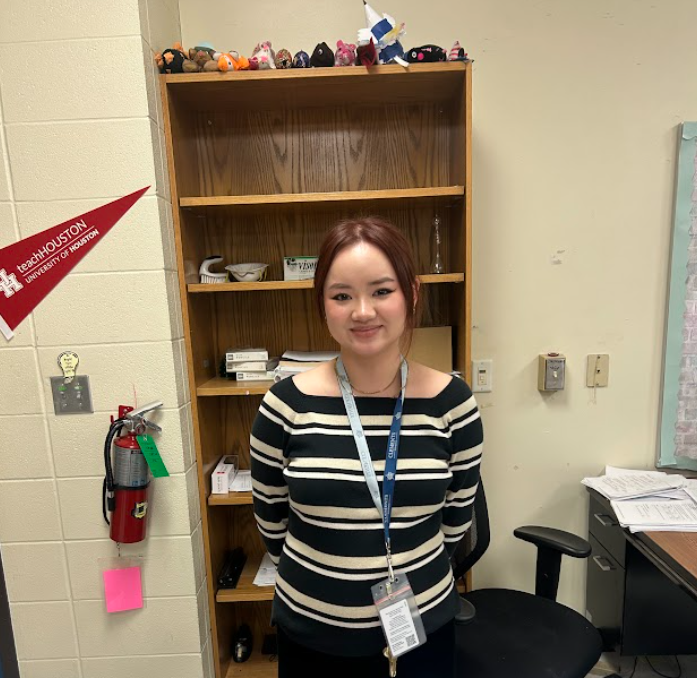 The new physics and chemistry teacher, Kristen Pham, keeps her collection of stuffed animals on the topmost layer of her classroom shelf.