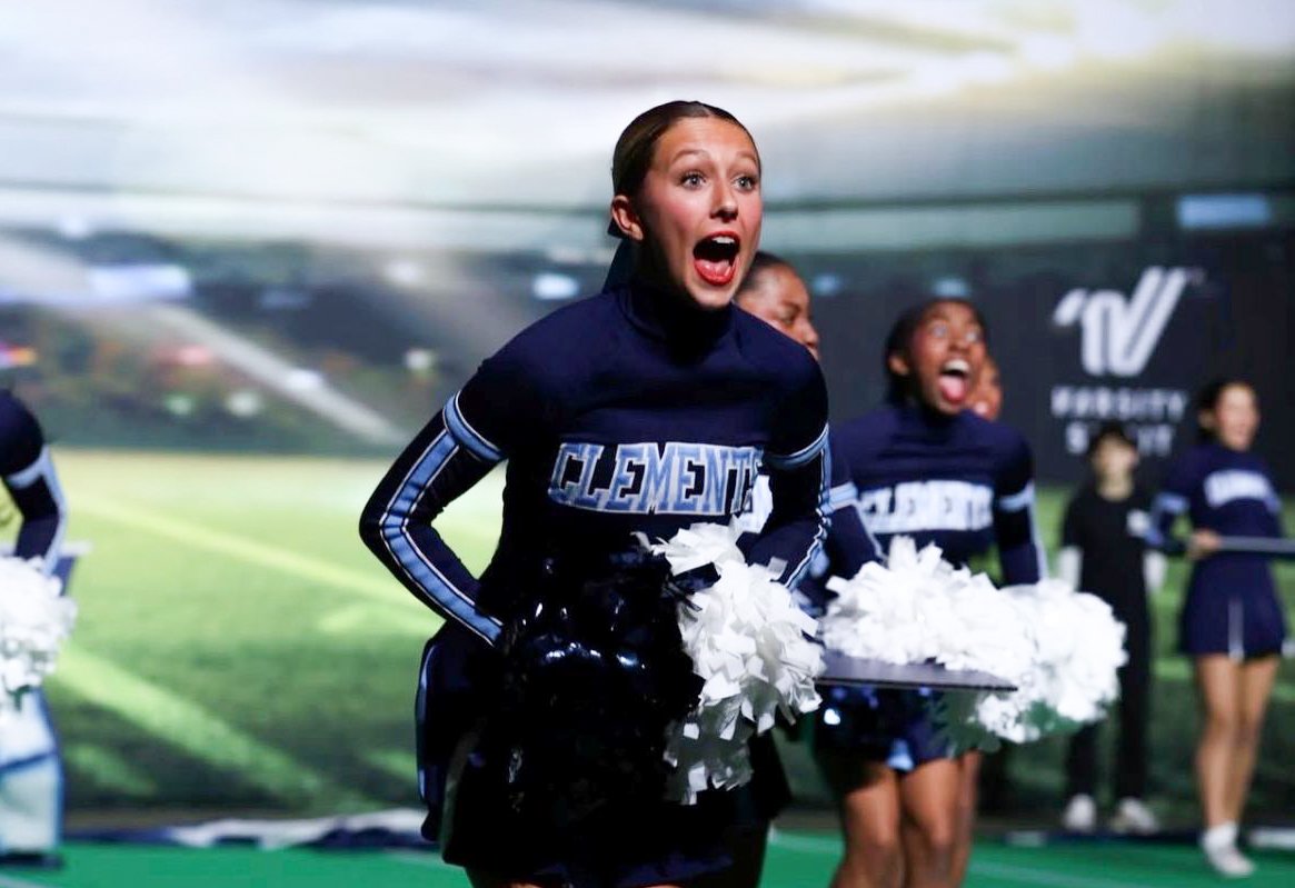 Junior Abigail Bowlin executing her cheer routine at the State UIL competition.