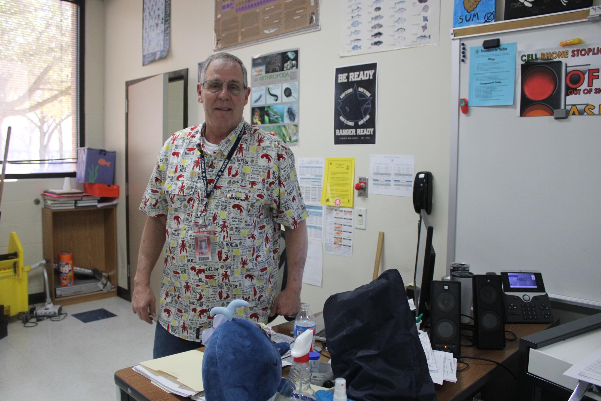 Aquatic Science teacher Mark Schubert stands in his classroom, where he has taught for decades. 
