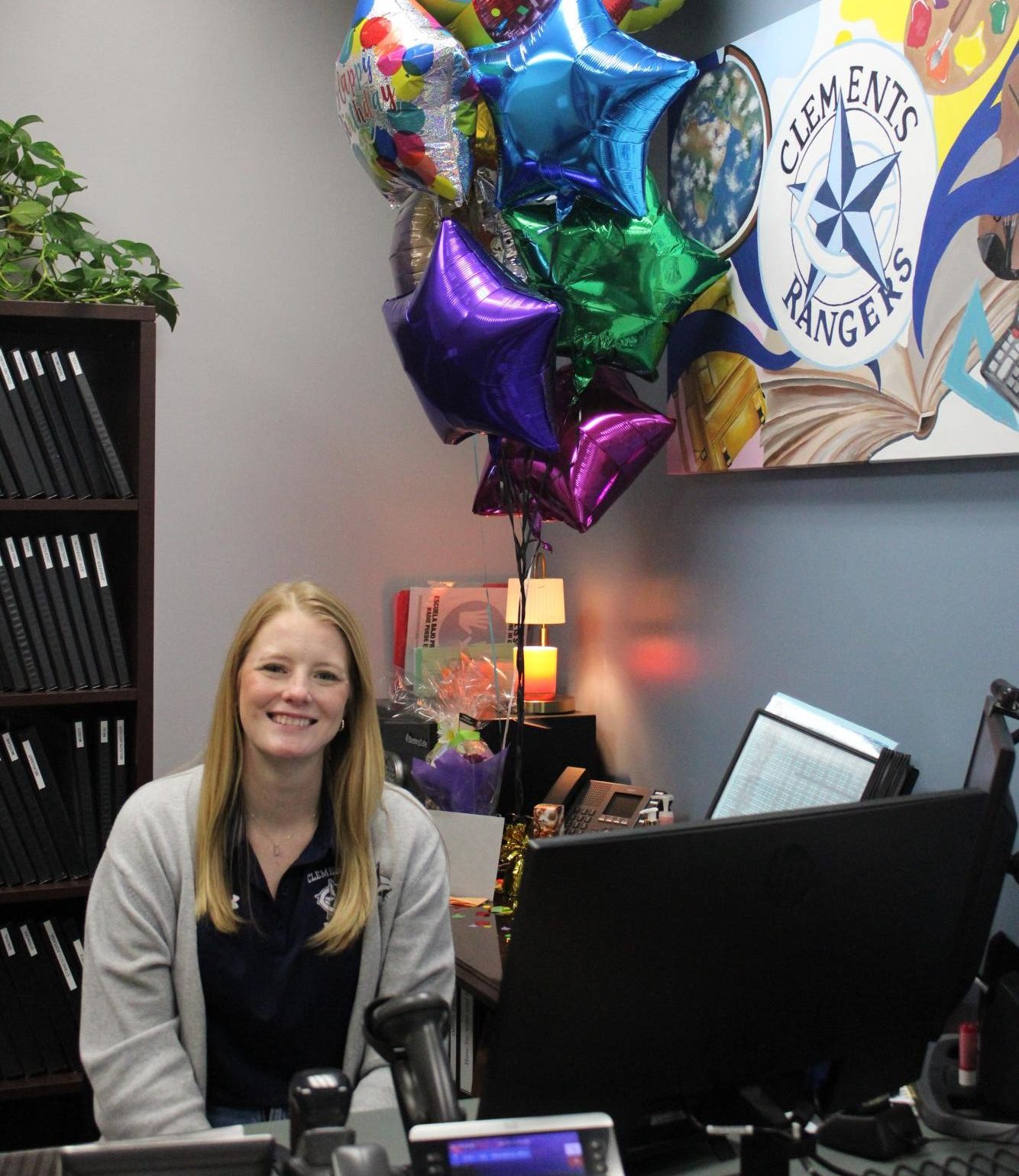Administrative assistant Kaylin Lucas manages the substitutes for the campus and helps out assistant principals Eric Sweeney and Shannon Gray.