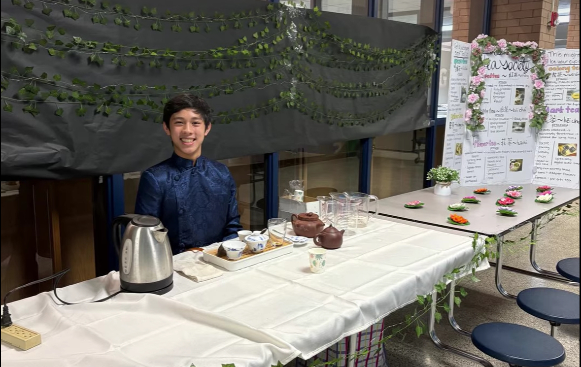 Sophomore Alex Su, the Tea Club founder and president, in traditional Chinese attire for Clement's annual International Festival (IFEST).