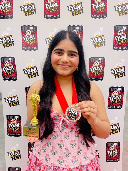 Junior Lipi Shah at Film Fest. She won first place in Sports Photography and third place in Student Life.